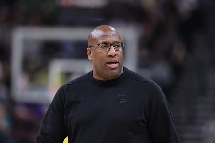 Mike Brown stands and stares.