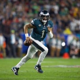 Philadelphia Eagles quarterback Jalen Hurts runs the ball.