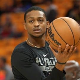 Sacramento Kings guard De'Aaron Fox holds the ball.