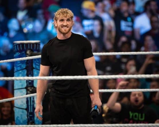 YouTube star turned WWE wrestler Logan Paul stands in the rin.