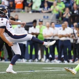 Denver Broncos place kicker Brandon McManus kicks the ball.