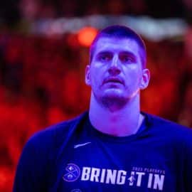 Nikola Jokic stands and stares.