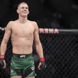 Ian Garry stands in the octagon.
