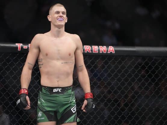 Ian Garry stands in the octagon.