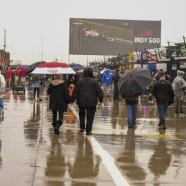 NASCAR fans walk in rain before charlotte 600 at charlotte (1)