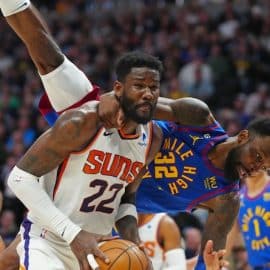 Phoenix Suns center Deandre Ayton stands up.