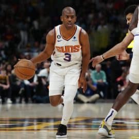 Phoenix Suns guard Chris Paul dribbles.