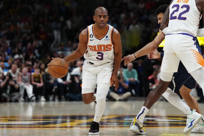 Phoenix Suns guard Chris Paul dribbles.