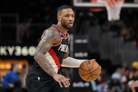 Portland Trail Blazers guard Damian Lillard (0) controls the ball