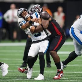 bryce young sacked by falcons DL in opener (1)