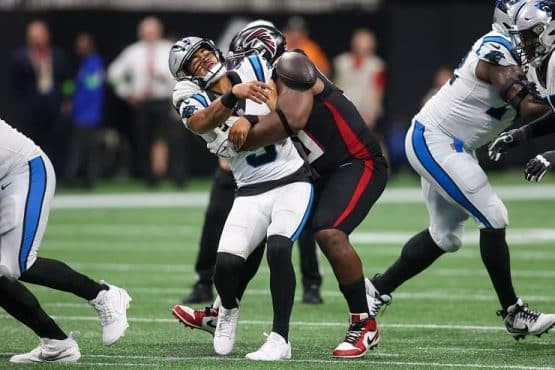 bryce young sacked by falcons DL in opener (1)