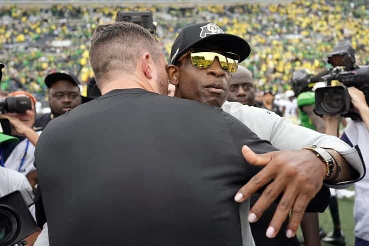 coach prime hugs oregon coach (1)