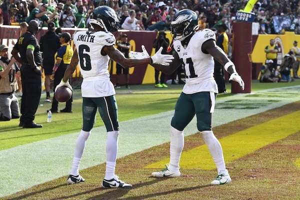 Philadelphia Eagles wide receiver DeVonta Smith (6) celebrates with wide receiver A.J. Brown
