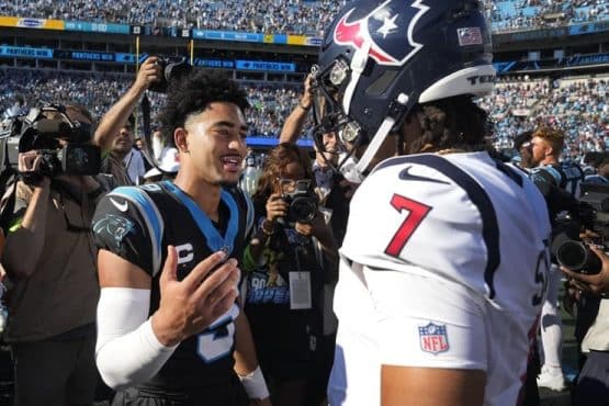 bryce young shakes hand with old friend cj stroud (1)