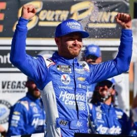 kyle larson raises arms in victory at las vegas (1)