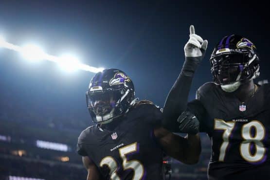Baltimore Ravens running back Gus Edwards