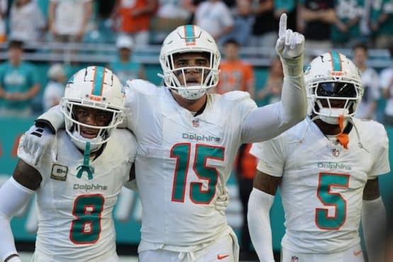 Miami Dolphins linebacker Jaelan Phillips (15) celebrates an interception during the second half of an NFL game