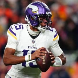 Minnesota Viking quarterback Joshua Dobbs (15) drops back to pass against the Denver Broncos