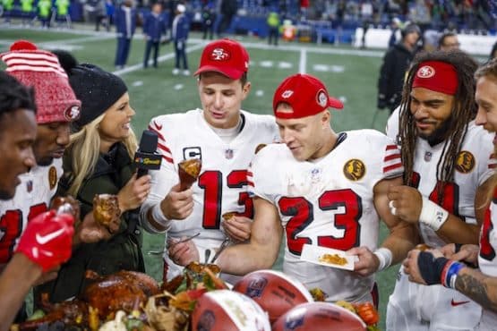 San Francisco 49ers quarterback Brock Purdy (13), running back Christian McCaffrey
