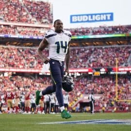 Seattle Seahawks wide receiver DK Metcalf (14) runs towards the locker room