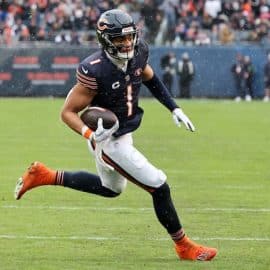 Chicago Bears quarterback Justin Fields (1) rushes for a touchdown