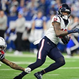 Houston Texans wide receiver Nico Collins (12) catches a long pass