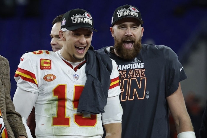 ; Kansas City Chiefs quarterback Patrick Mahomes (15) and Chiefs tight end Travis Kelce (R)