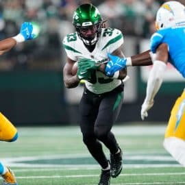 New York Jets running back Dalvin Cook (33) runs the ball