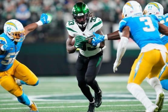 New York Jets running back Dalvin Cook (33) runs the ball