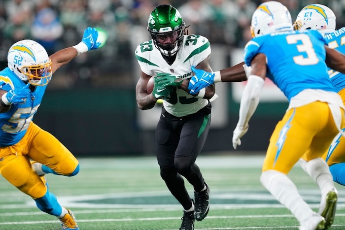 New York Jets running back Dalvin Cook (33) runs the ball