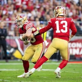 San Francisco 49ers quarterback Brock Purdy (13) hands off the ball to running back Christian McCaffrey (23)