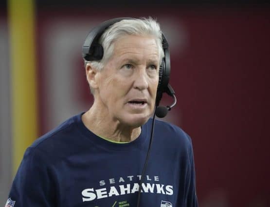 Seattle Seahawks head coach Pete Carroll looks toward the scoreboard