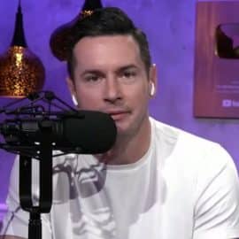 JJ Redick speaks into a microphone.