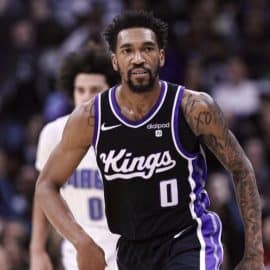 Malik Monk of the Kings runs up the court.