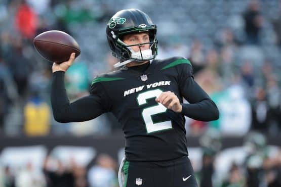 New York Jets quarterback Zach Wilson (2) warms up before the game