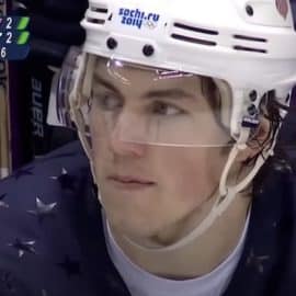T.J. Oshie sits on a bench.