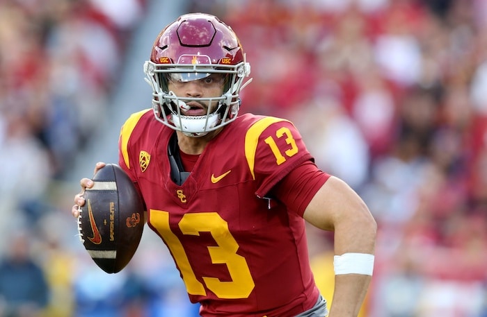 USC Trojans quarterback Caleb Williams (13) scrambles during the second quarter