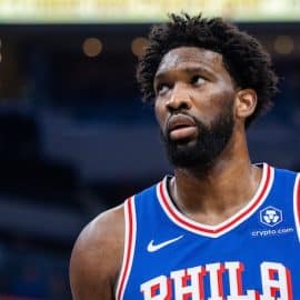 Joel Embiid looks up and stares.