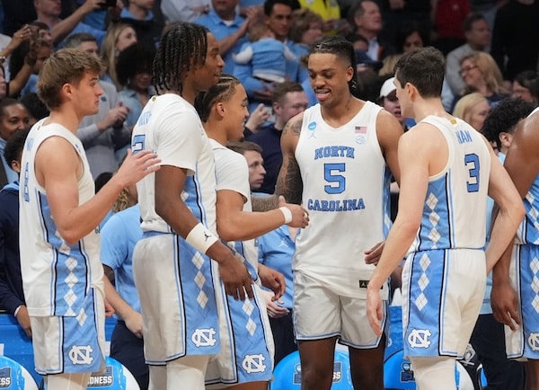 North Carolina Tar Heels forward Armando Bacot (5) celebrates with teammates