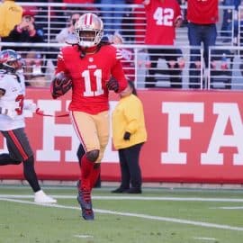 an Francisco 49ers wide receiver Brandon Aiyuk (11) runs after a catch