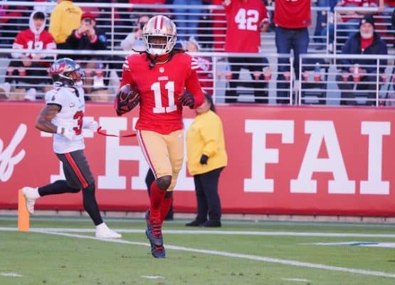 an Francisco 49ers wide receiver Brandon Aiyuk (11) runs after a catch