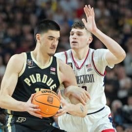 Apr 8, 2024; Glendale, AZ, USA; Purdue Boilermakers center Zach Edey (15) controls the ball against Connecticut Huskies