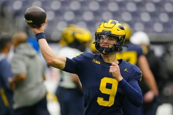 Michigan Wolverines quarterback J.J. McCarthy (9) passes the ball
