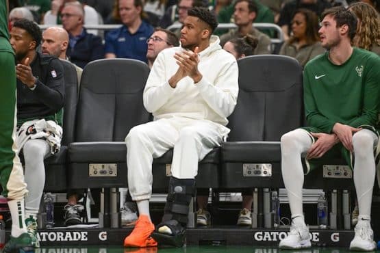 Milwaukee Bucks forward Giannis Antetokounmpo (34) sits on the bench