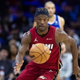 Miami Heat forward Jimmy Butler (22) picks up a loose ball