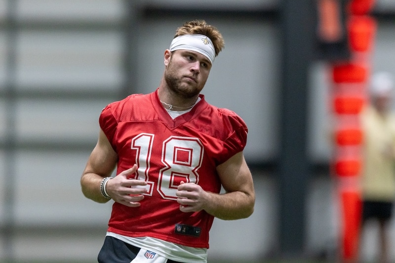 Hunter Dekker runs on the field.