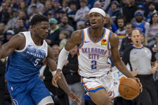 Oklahoma City Thunder guard Shai Gilgeous-Alexander dribbles the ball.