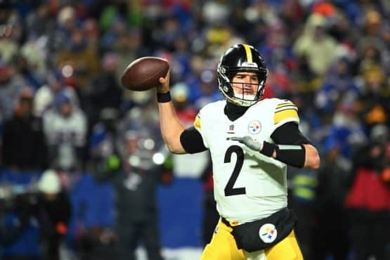 Mason Rudolph throws a football for the Steelers.