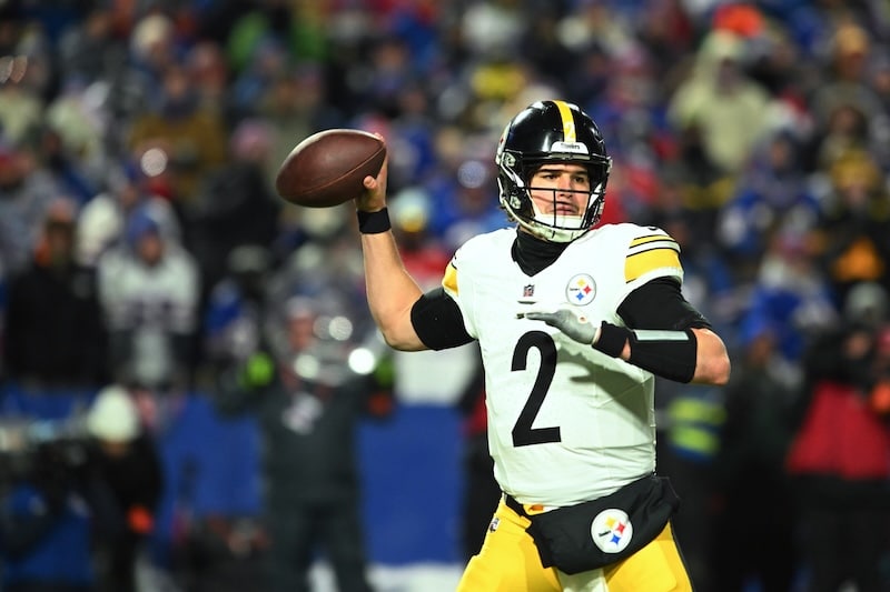 Mason Rudolph throws a football for the Steelers.