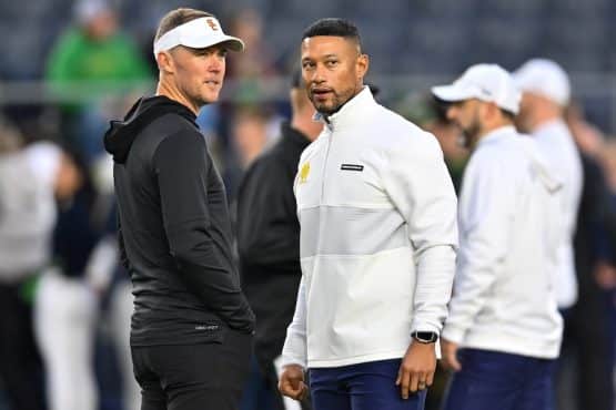 USC Trojans head coach Lincoln Riley and Notre Dame Fighting Irish head coach Marcus Freeman.